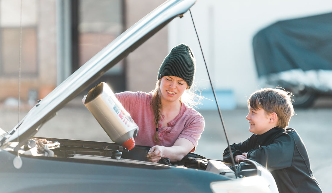 topping up fluids in car