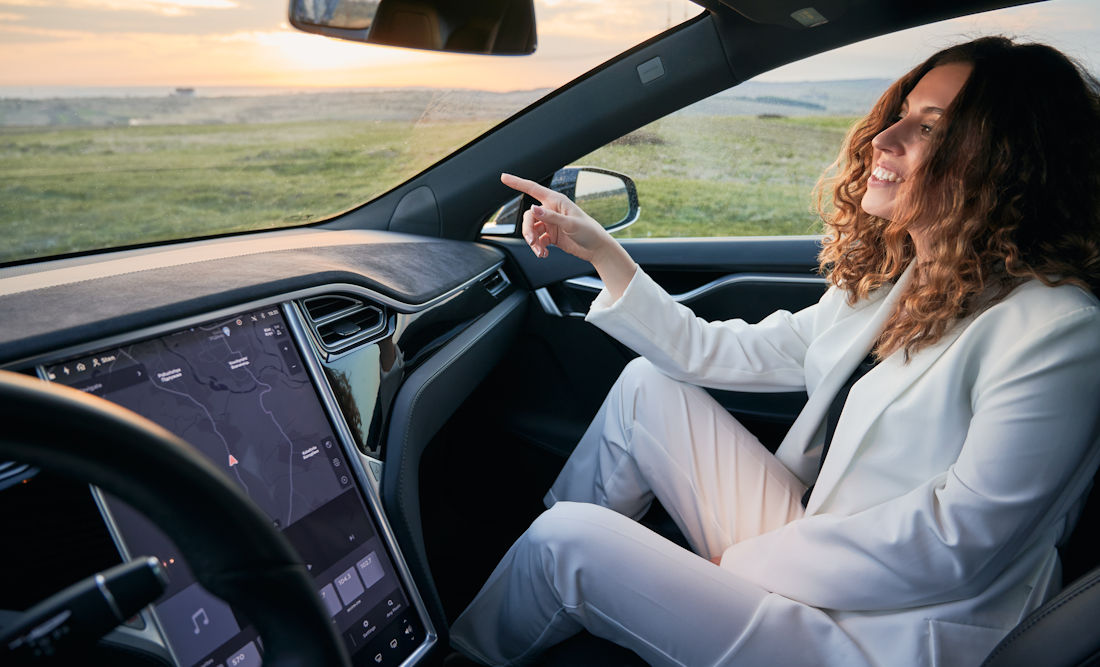 sitting in the passenger seat