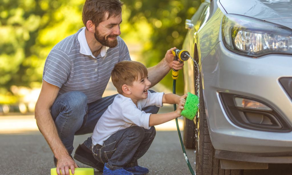 washing car with help of child